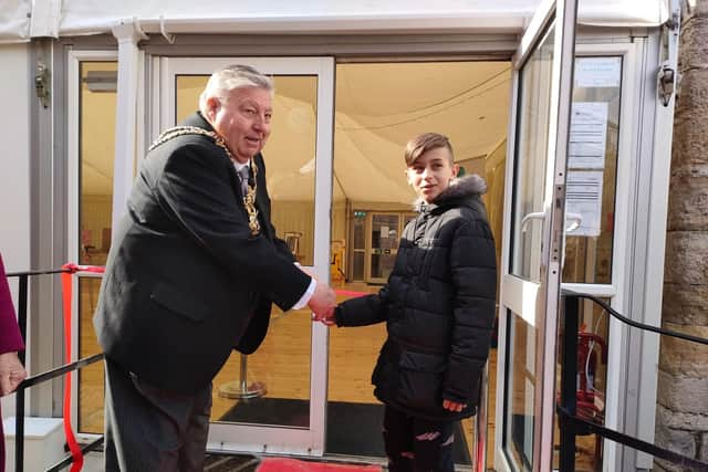 The Lord Mayor and one of the Sailors open the exhibition. 