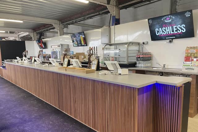 The revamped kiosk at the far end of North Stand Lower, towards the Milton End corner.