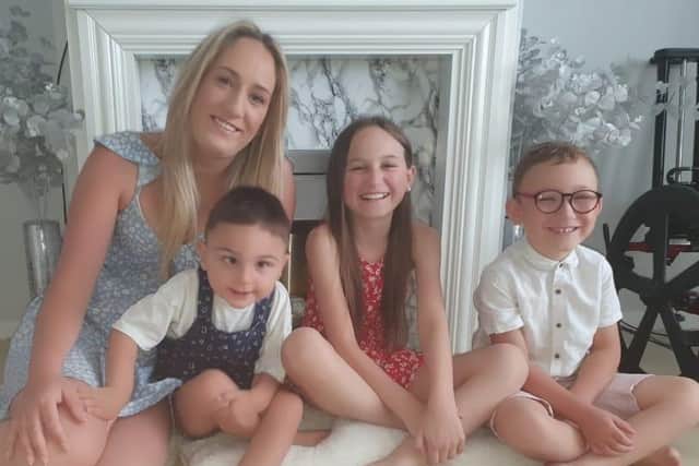A Portsmouth mum has set up a fundraiser for her two-year-old baby with an undiagnosed brain condition, hoping to find some answers. Pictured from L to R: Paula Burns, Ezekiel, two, Aria, nine, and Ezra, five. Picture: Paula Burns.