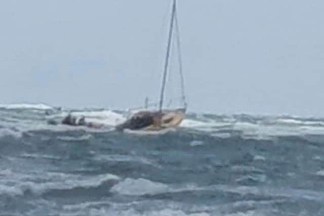 Hayling Island RNLI crew saving three men on strickent boat off West Wittering. Pic: Lloyd Pepperell