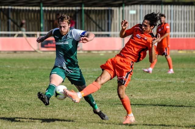 Archie Greenough, right, in action for AFC Portchester, scored his 21st goal of the season for Petersfield on Tuesday in their latest victory over Newport IoW. Picture by Daniel Haswell