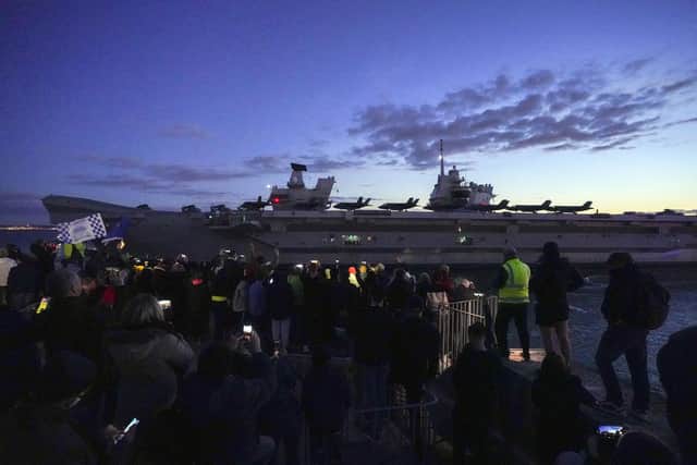 HMS Queen Elizabeth departs HM Naval Base, Portsmouth, for her maiden deployment to lead the UK Carrier Strike Group on a 28-week operational deployment travelling over 26,000 nautical miles from the Mediterranean to the Philippine Sea. Picture date: Saturday May 22, 2021.