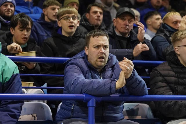 Pompey fans backed their team to a crucial Championship survival win over Cardiff last night.