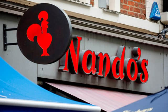Nando's has had to close stores across the country. Picture: TOLGA AKMEN/AFP via Getty Images