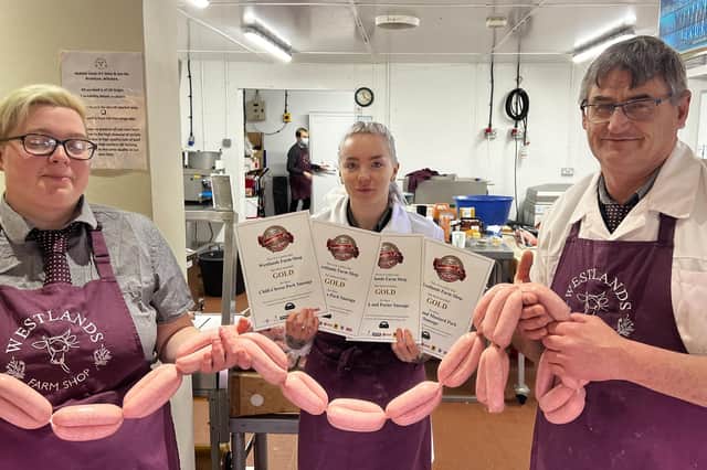Suzi, Jasmine and Morny from the butchery team at Westlands Farm Shop in the Meon Valley with their Gold certificates and their prize-winning bangers