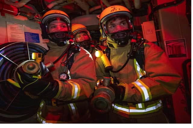 Concerns have been raised over how MoD contractors treat their staff. Pictured, firefighters working in the MoD.