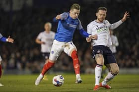Ronan Curtis, pictured battling with Bolton defender Gethin Jones on Tuesday night, is out of contract in the summer. Picture: Jason Brown/ProSportsImages