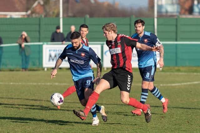 Simon Woods (red/black) scored Fareham's second goal in their 2-0 Portsmouth Senior Cup win at US Portsmouth Reserves. Picture: Vernon Nash (230219-124)