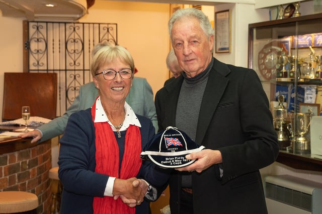 Brian Purdy accepts his GB cap from Sheila Monroe. Picture: Keith Woodland