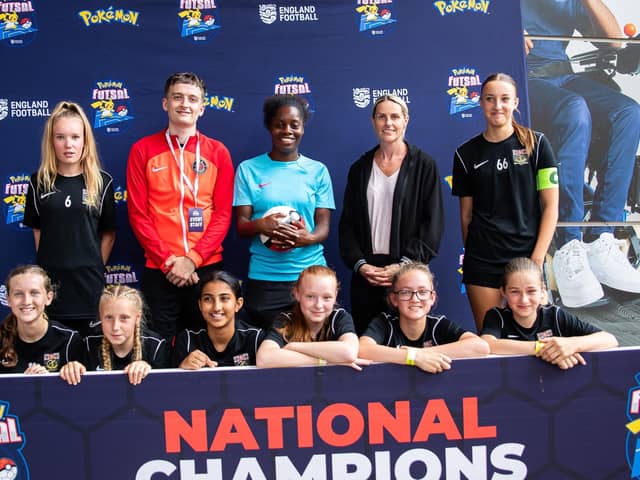 Freestyler Jamie Shawyer, Charlton player Freda Ayisi and England international legend Kelly Smith with Fareham Town Youth Under-12 Girls. Picture by Jess Hornby, The FA via Getty Images