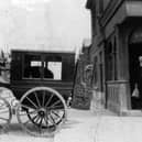 Old Lloyds bank. Not the wild west but perhaps wild east. A bank teller loads cash from the bank on the corner of Glasgow Road, Eastney.