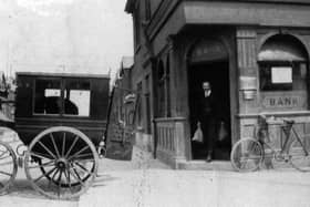 Old Lloyds bank. Not the wild west but perhaps wild east. A bank teller loads cash from the bank on the corner of Glasgow Road, Eastney.