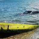 The car on the dive ramp at East Beach, Selsey. Picture courtesy of Selsey Coastguard Rescue Team