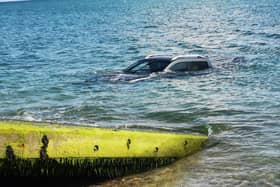 The car on the dive ramp at East Beach, Selsey. Picture courtesy of Selsey Coastguard Rescue Team