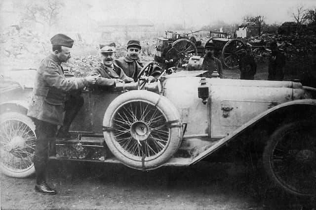 Bob (centre) in the Argonne during Christmas 1914 driving his Mors Sports car alongside Andre Citroen (left) then an artillery officer in the French army. Person to the right is unknown.