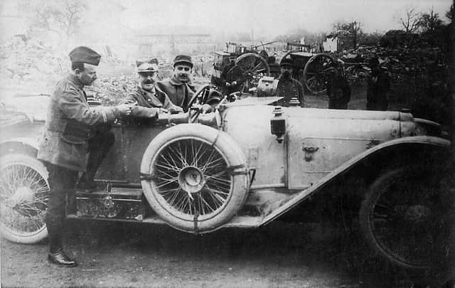 Bob (centre) in the Argonne during Christmas 1914 driving his Mors Sports car alongside Andre Citroen (left) then an artillery officer in the French army. Person to the right is unknown.