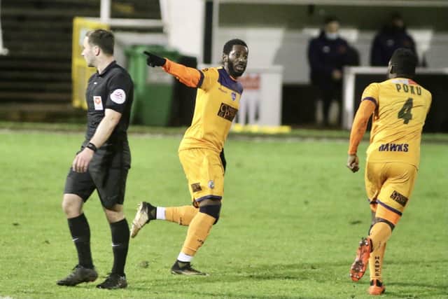 Roarie Deacon wheels away after scoring in the first half. Pic: Kieron Louloudis.