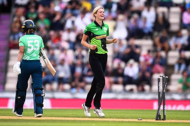 Brave's Lauren Bell  celebrates after taking the wicket of Invincibles' Tash Farrant. Photo by Harry Trump/Getty Images.