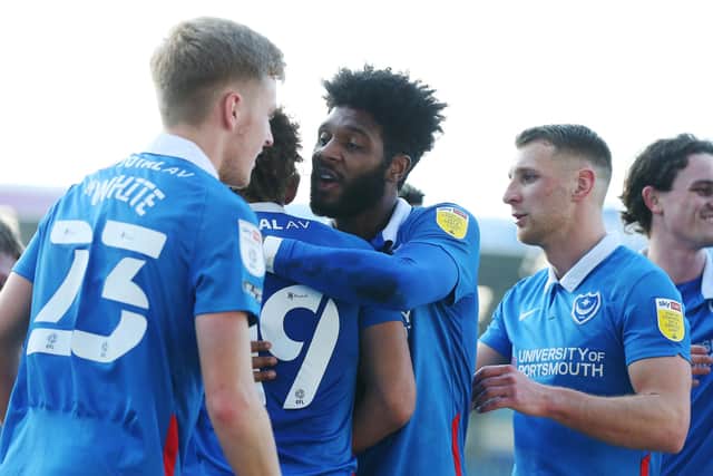 Ellis Harrisom, centre, is attracting interest from both Oxford and Fleetwood.