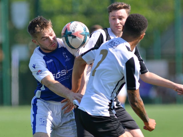 Denmead (blue) v Hayling. Picture by Martyn White