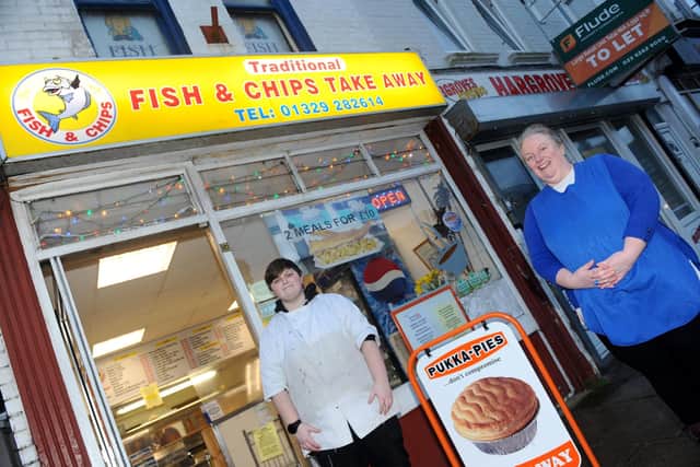 Freyah Tyrrell, fish and chip shop assistant with owner Rebecca Traynor.
Picture: Sarah Standing (190221-3298)