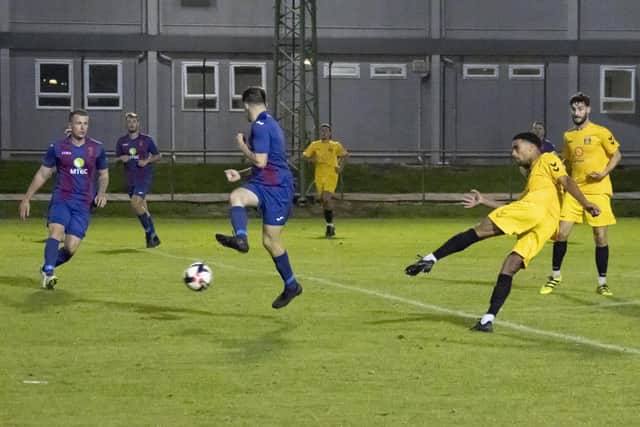 Casey Bartlett-Scott scores for Fareham in their midweek Portsmouth Senior Cup win at US Portsmouth. Picture by Ken Walker.