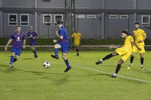 Casey Bartlett-Scott scores for Fareham in their midweek Portsmouth Senior Cup win at US Portsmouth. Picture by Ken Walker.