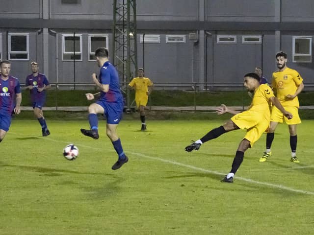 Casey Bartlett-Scott scores for Fareham in their midweek Portsmouth Senior Cup win at US Portsmouth. Picture by Ken Walker.