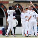 Hat-trick hero Kyle Abbott  celebrates with teammates after taking one of his six second innings wickets at Cheltenham. Photo by Ryan Hiscott/Getty Images