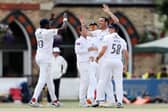 Hat-trick hero Kyle Abbott  celebrates with teammates after taking one of his six second innings wickets at Cheltenham. Photo by Ryan Hiscott/Getty Images