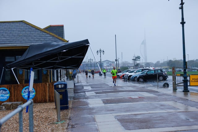 The wind threatened to take a gazebo with it.