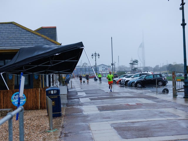 The wind threatened to take a gazebo with it.