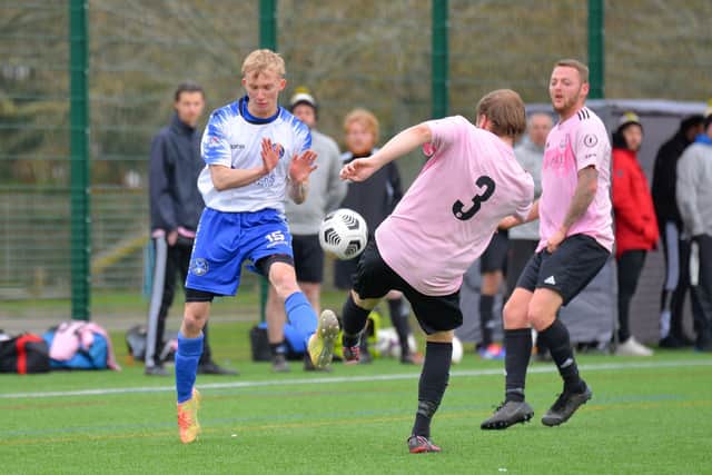 Clanfield's Jake Callaghan (left) in action during their cup loss at Harvest. Picture: Martyn White.