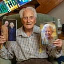 Eric Moore with the card he received on his 108th birthday - alongside one of his previous cards from the Queen. Picture: Mike Cooter (110324)