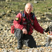Bug Wrightson, from Hayling Island, is a volunteer with Hampshire Search & Rescue Dogs. He is pictured with his working Springer Spaniel, Oppo. Picture: Sarah Standing (061120-8820)