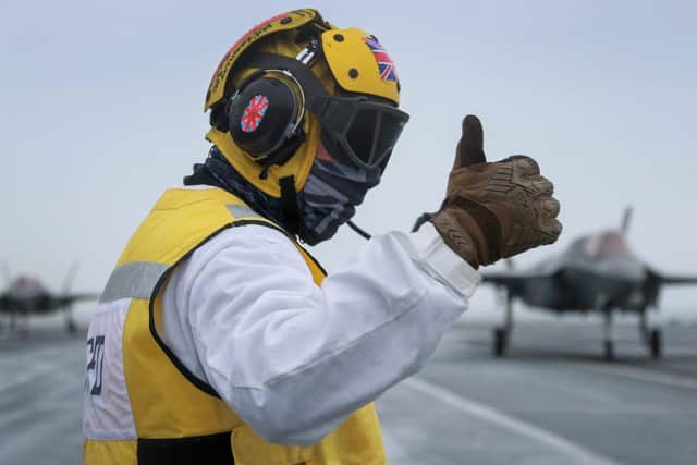 Thumbs up: HMS Queen Elizabeth has declared flagship-ready by naval assessors in a huge milestone for the aircraft carrier. Photo: Royal Navy