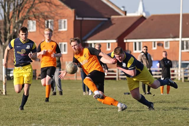 Pelham (blue & yellow) v AFC Farlington. Picture by Kevin Shipp