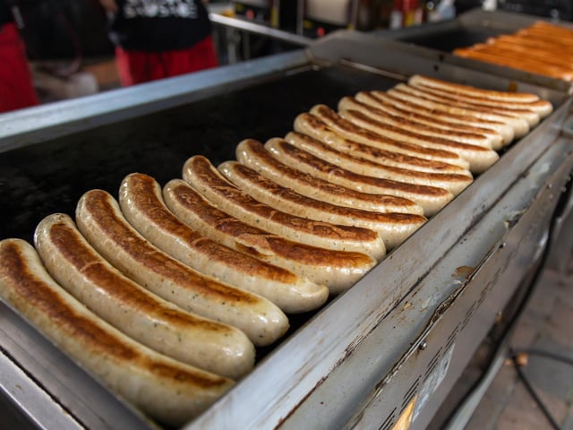 Sizzling Bratwursts ready to feed the crowd. Picture: Mike Cooter (240922)