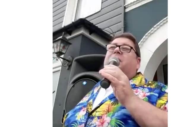Part-time entertainer Andy George who performed a gig in his driveway to raise cash for the NHS and QA. 

Picture: Andy George