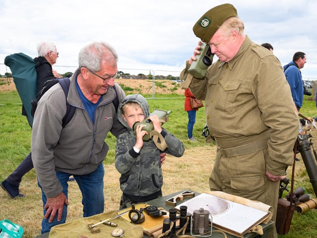Pictured is: Grandpa Gelder with Joseph toys out the radio at the 1st Dorsets stand with Alwyn BryantPicture: Keith Woodland (080621-60)