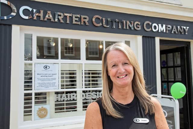 Debbie Hulbert (59) from The Charter Cutting Company in Emsworth celebrates her 36th anniversary by holding a fundraising day for Rowan's Hospice. Picture: Mike Cooter (240621)
