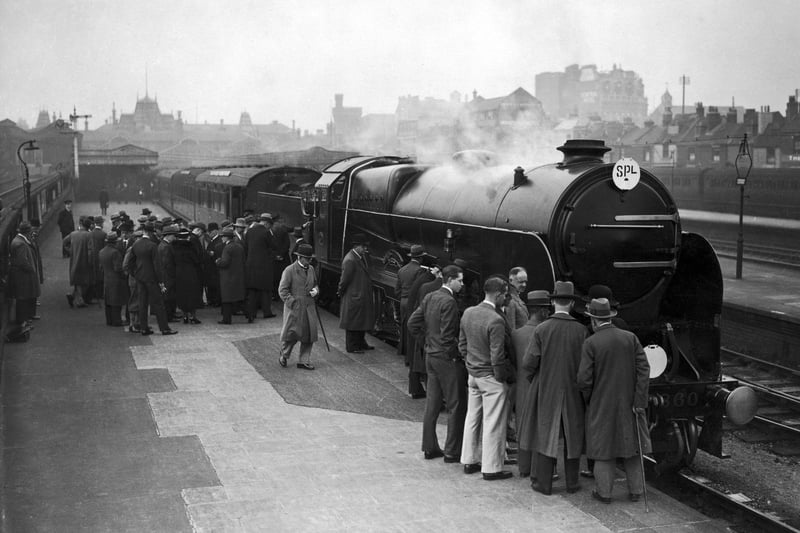 Visitors look over the Lord Nelson Class locomotive, Lord Hawke, during a train exhibition at Portsmouth Town Station, 21st October 1933. (Photo by J. A. Hampton/Topical Press Agency/Hulton Archive/Getty Images)