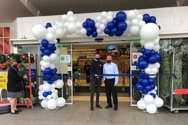 Harry Mooney, one of the managers in charge of the refit, joined store
manager Andy Grainger at Tesco Whiteley for its official reopening