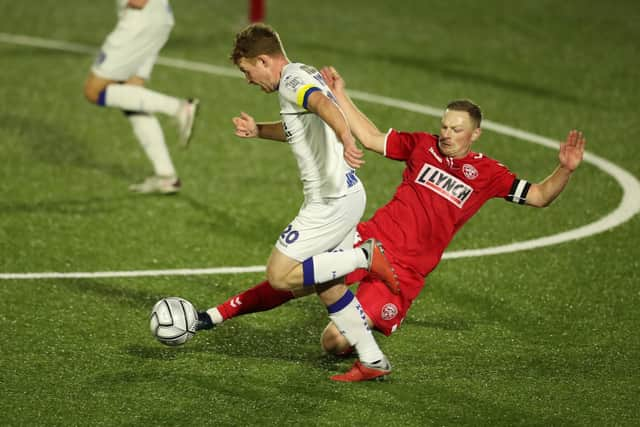 Tommy Wright gets past the challenge of Hemel's Sam Mantom. Picture: Dave Haines.