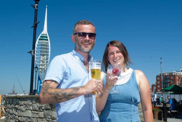 Dave and Hailey Durrant outside Spice Island Inn, Old Portsmouth on a warm sunny day. Picture: Habibur Rahman
