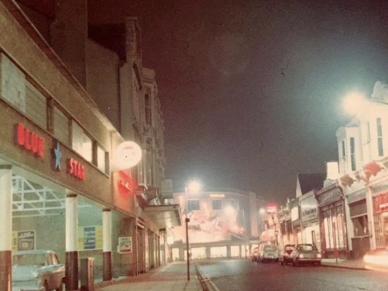 Images from 1960s Portsmouth by Courtney Photographics  Pictured: 1968 -  Palmerston Road, Southsea. Check out the Blue Star garage on the left and Handleys Superstore in at the end of the road.  Picture: Courtney Photographics