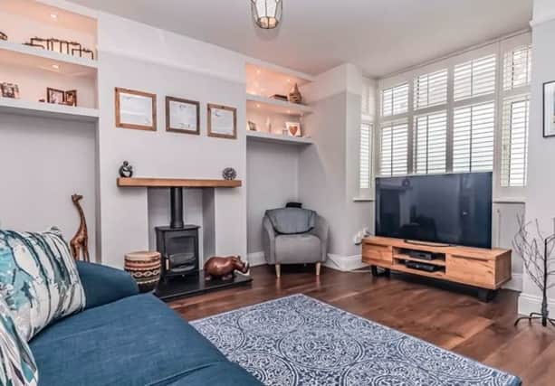 The listing says: "This excellently presented, extended end-of-terrace property has accommodation set over three inviting floors, with three bedrooms and a separate study room, making it an ideal family home."