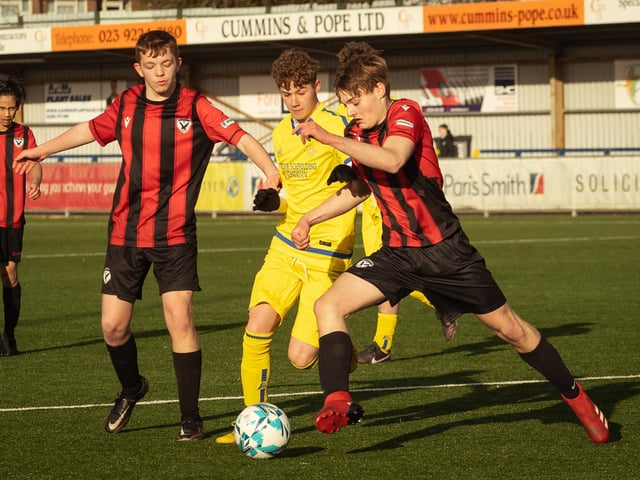 Action from the U16 GEC Marconi Invitation Cup final between Horndean Hawks Condors (red/black) and Pickwick Youth Panthers (yellow). Picture: Keith Woodland (260221-469)