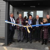 Alan Mak officially opens the new building at Westleigh Park watched by Hawks officials (from left) Tim Mellor (vice chairman), Trevor Brock (director/secretary, Derek Pope (chairman), Sue Pope, Mark Pope (director), Stuart Munro (chief executive) and Paul Doswell (manager.Picture by Dave Haines.