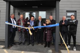 Alan Mak officially opens the new building at Westleigh Park watched by Hawks officials (from left) Tim Mellor (vice chairman), Trevor Brock (director/secretary, Derek Pope (chairman), Sue Pope, Mark Pope (director), Stuart Munro (chief executive) and Paul Doswell (manager.Picture by Dave Haines.